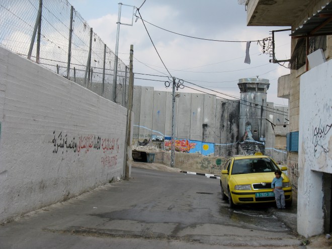 child in street at Aida Camp